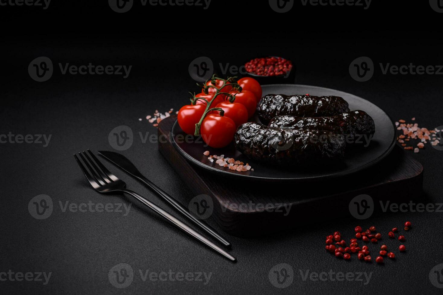 Delicious black blood sausage or black pudding with spices and herbs photo