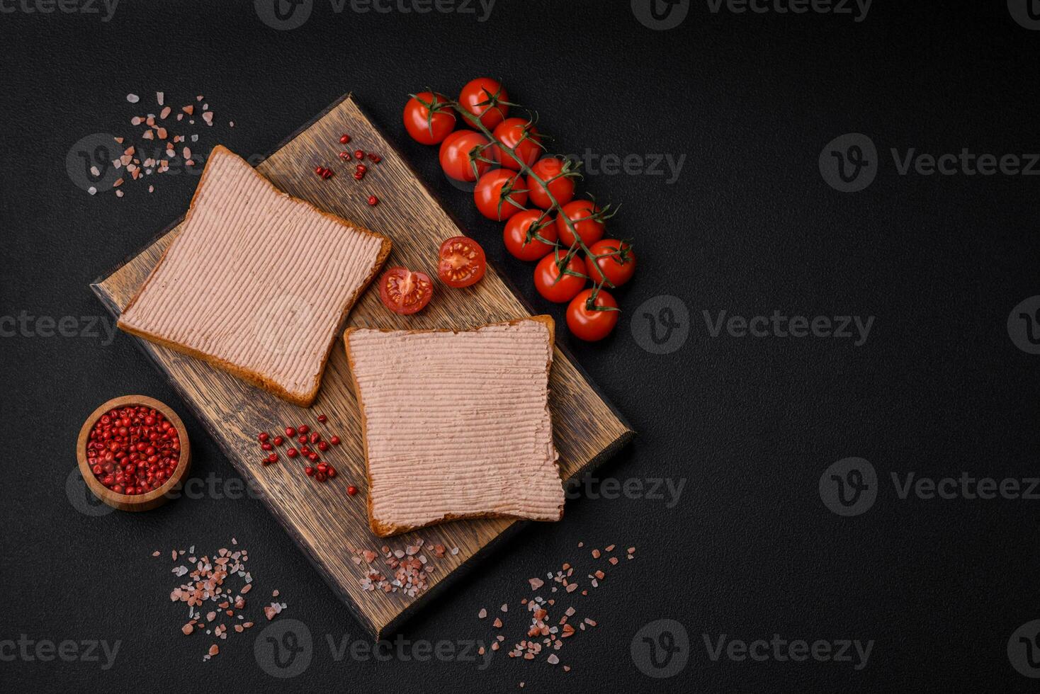 Delicious crispy toast with chicken or goose pate with salt and spices photo