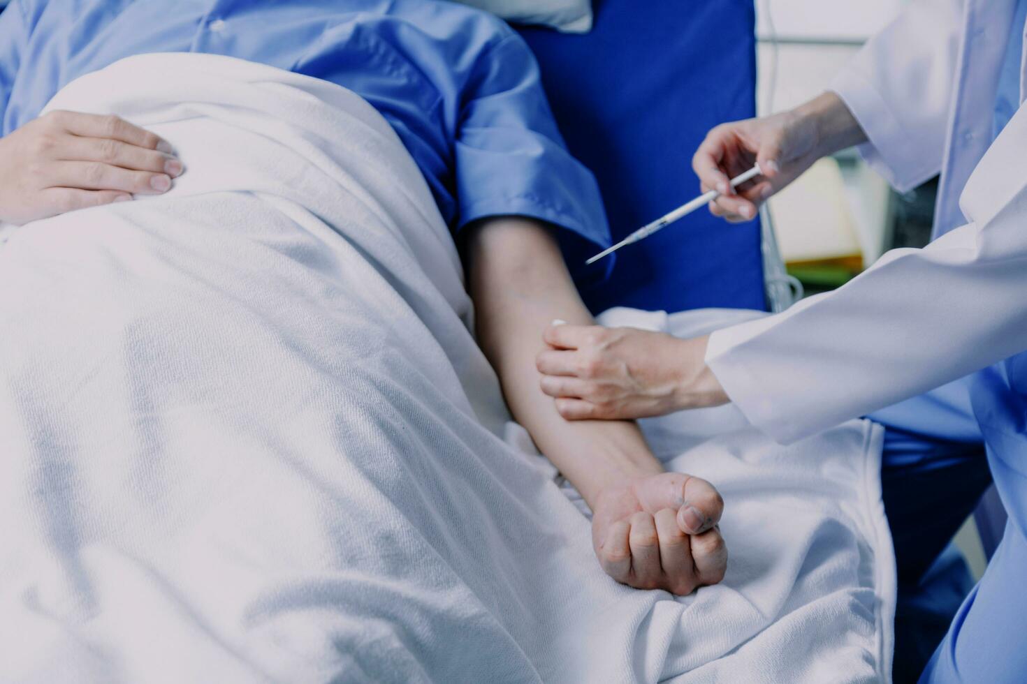 doctor check up after surgery. doctor touching patient hand and consoling. photo