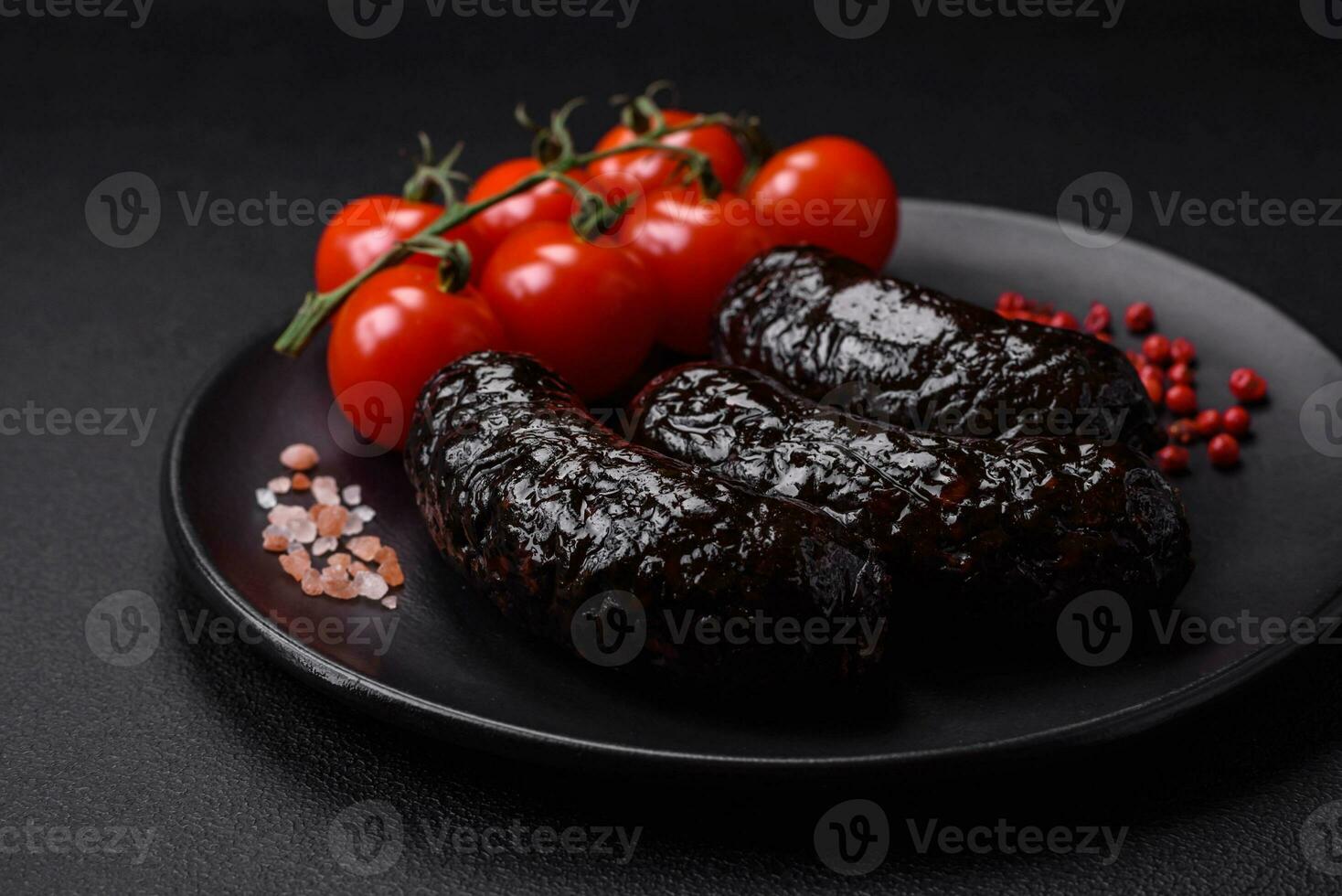 Delicious black blood sausage or black pudding with spices and herbs photo