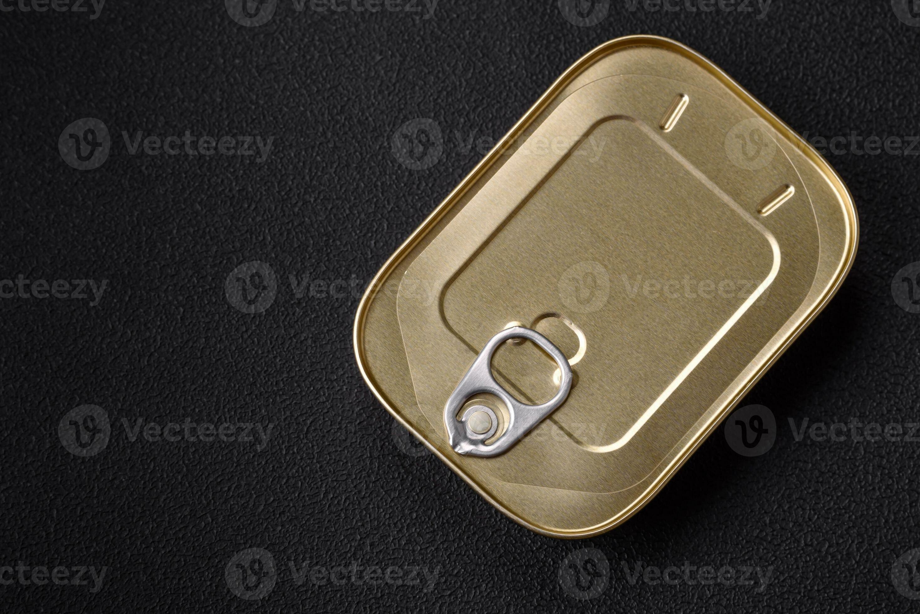 Tin or aluminum rectangular can of canned food with a key 24121207