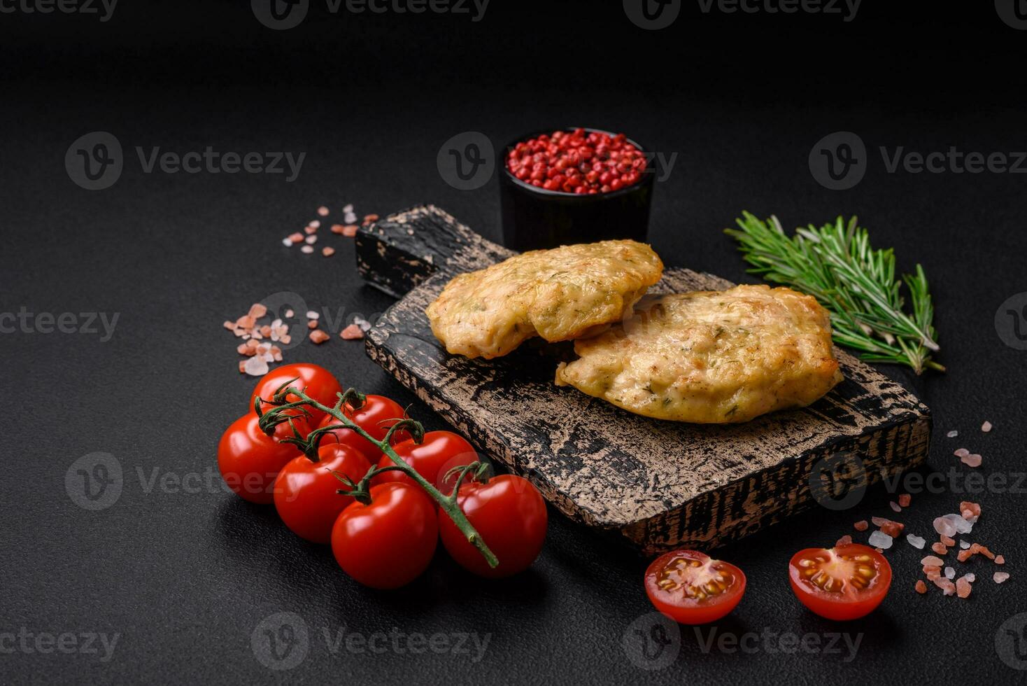 Delicious fried chopped fillet pancakes with spices, salt and herbs photo