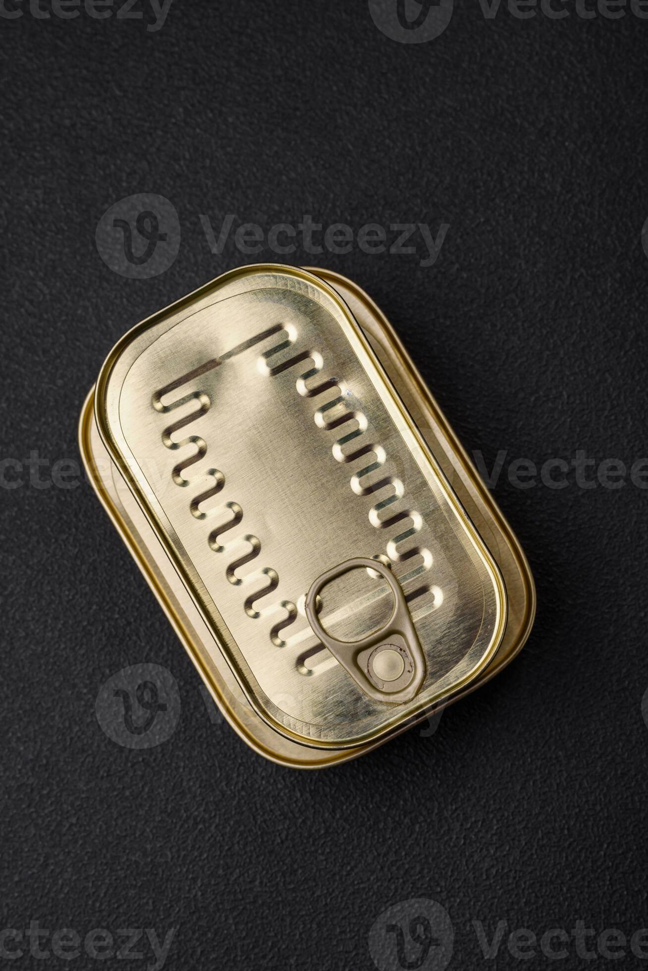 Tin or aluminum rectangular can of canned food with a key 24121448