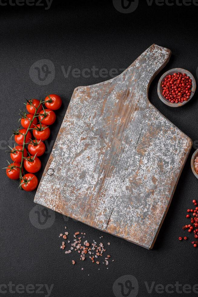 Empty wooden cutting board with cracks and scuffs photo