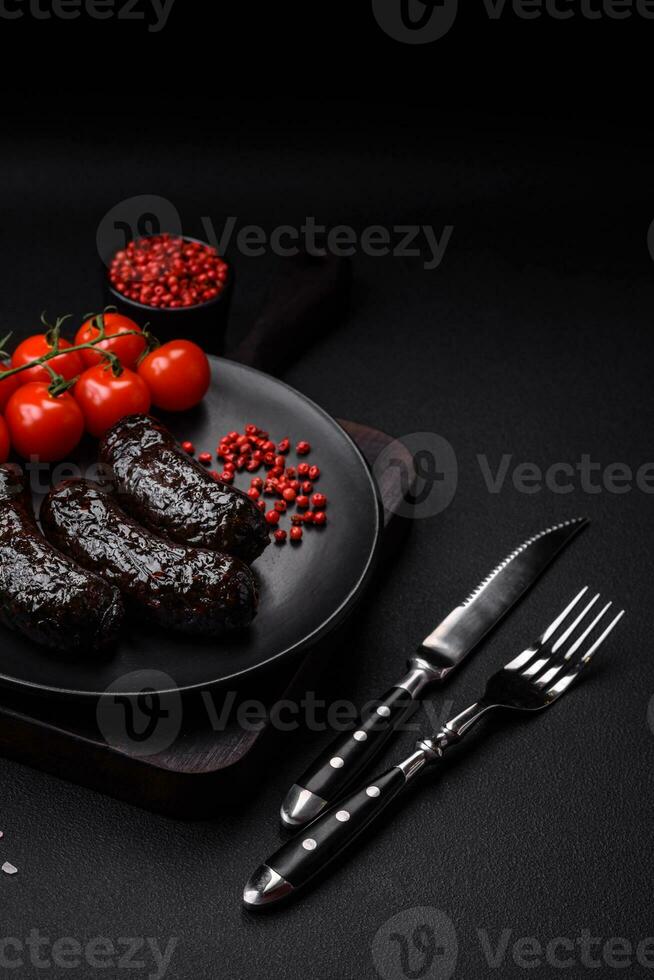 Delicious black blood sausage or black pudding with spices and herbs photo