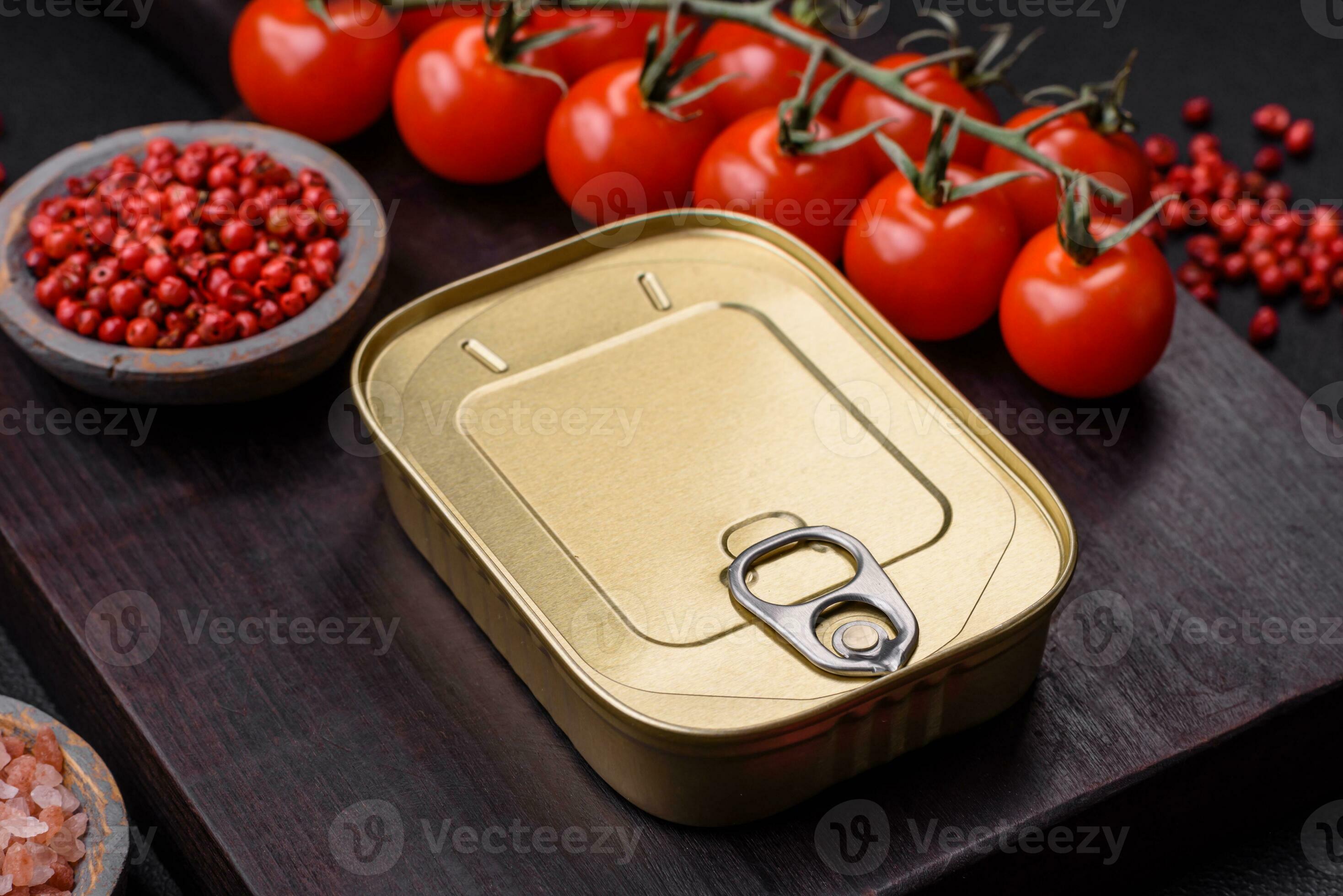 Tin or aluminum rectangular can of canned food with a key 24123608
