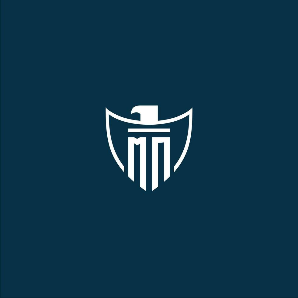 MN initial monogram logo for shield with eagle image vector design