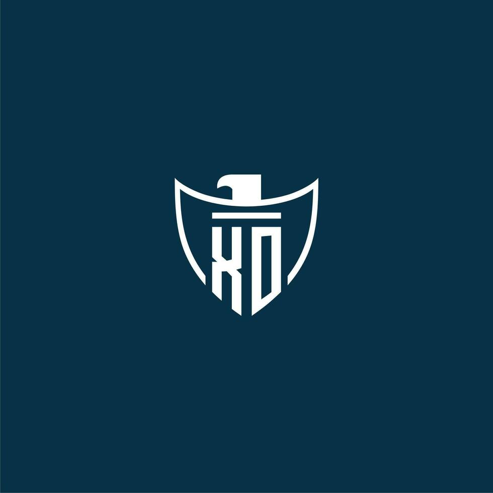 XO initial monogram logo for shield with eagle image vector design