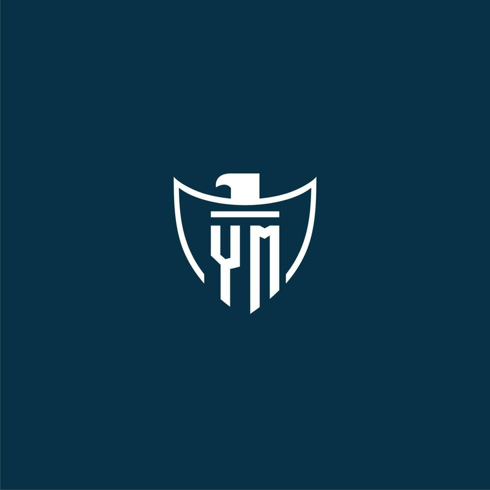 YM initial monogram logo for shield with eagle image vector design
