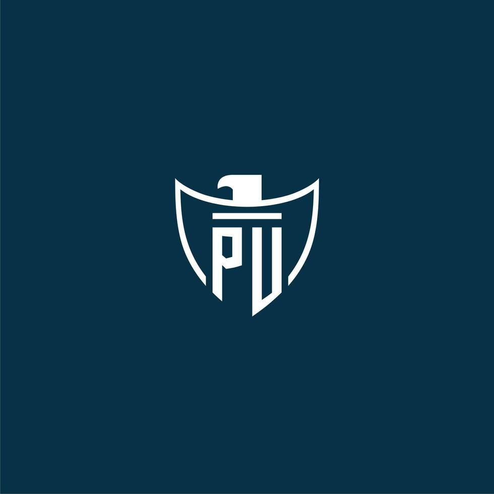 PU initial monogram logo for shield with eagle image vector design