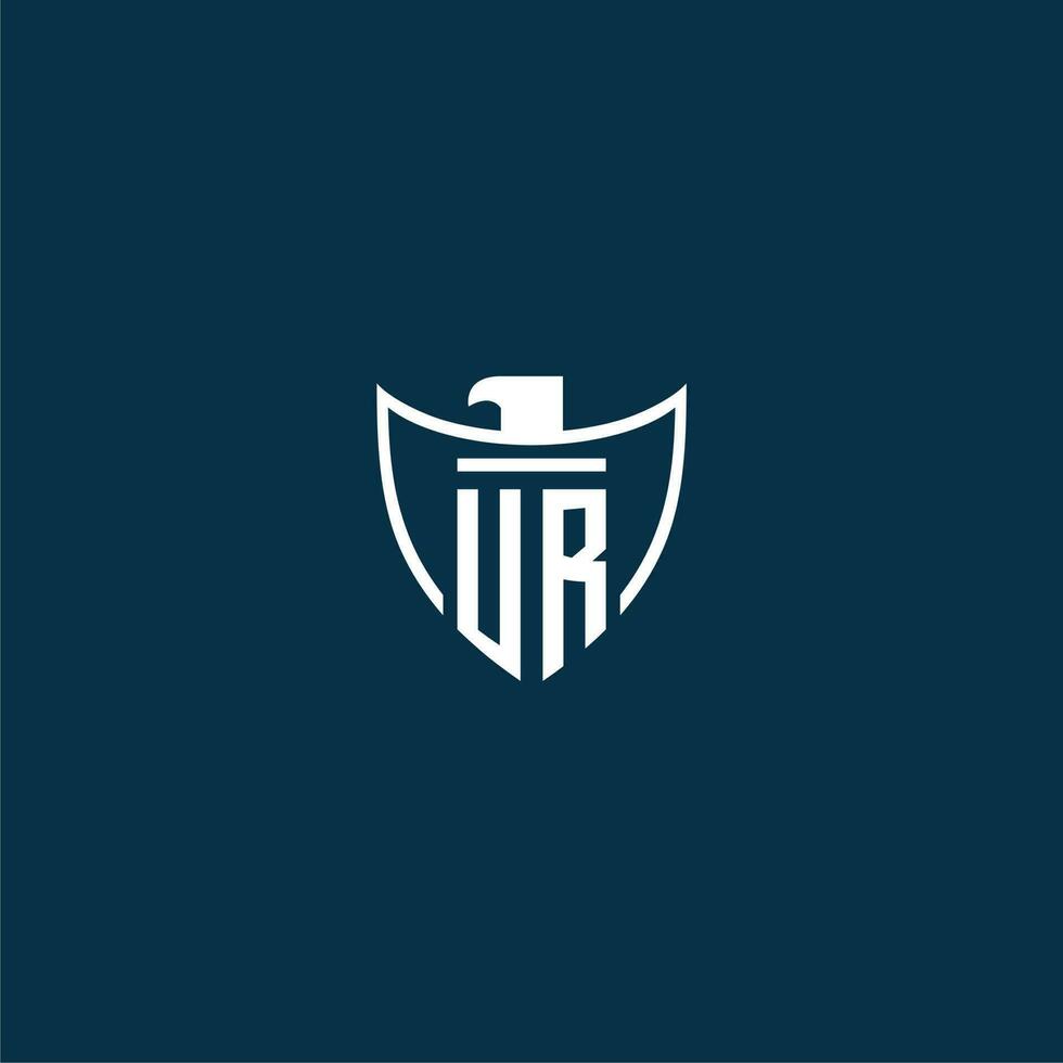 UR initial monogram logo for shield with eagle image vector design