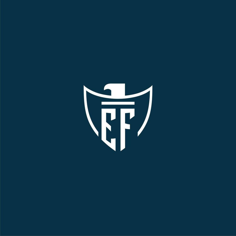 EF initial monogram logo for shield with eagle image vector design