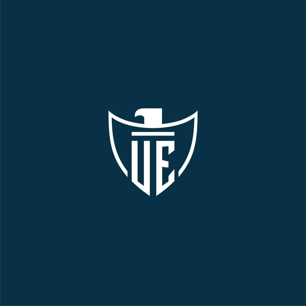 UE initial monogram logo for shield with eagle image vector design