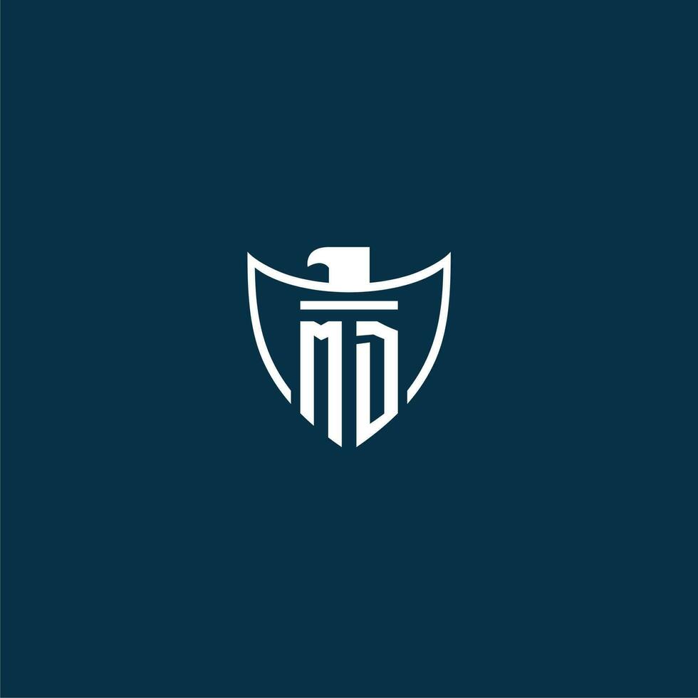 MD initial monogram logo for shield with eagle image vector design