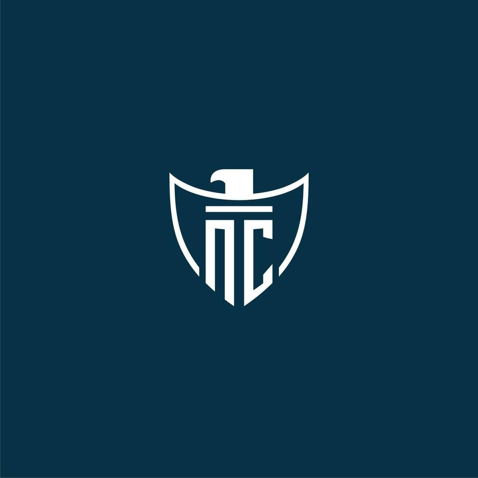 NC initial monogram logo for shield with eagle image vector design