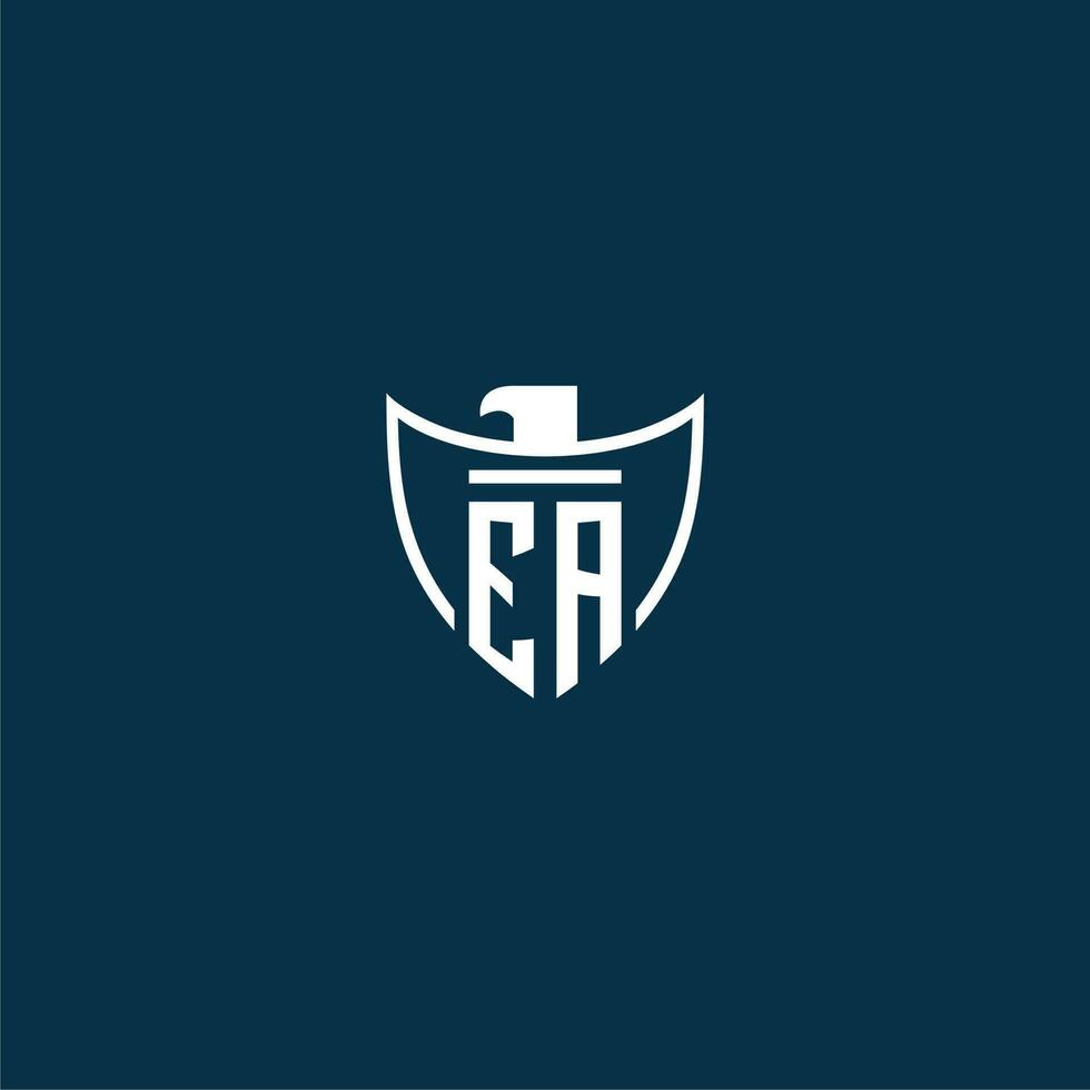 EA initial monogram logo for shield with eagle image vector design