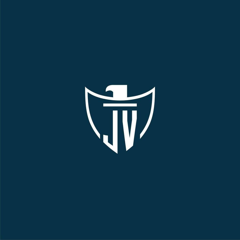 JV initial monogram logo for shield with eagle image vector design