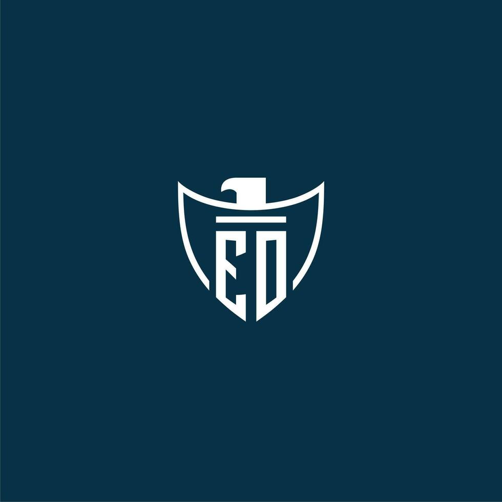 EO initial monogram logo for shield with eagle image vector design