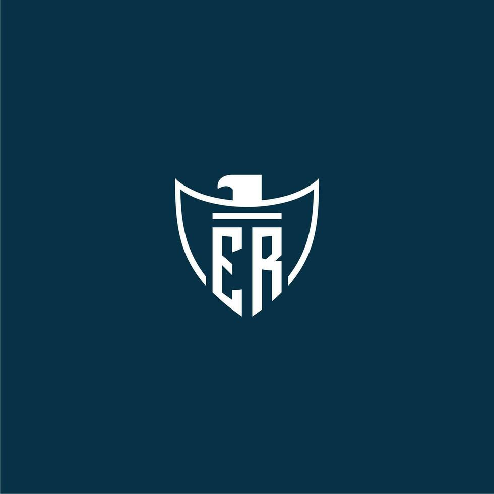 ER initial monogram logo for shield with eagle image vector design