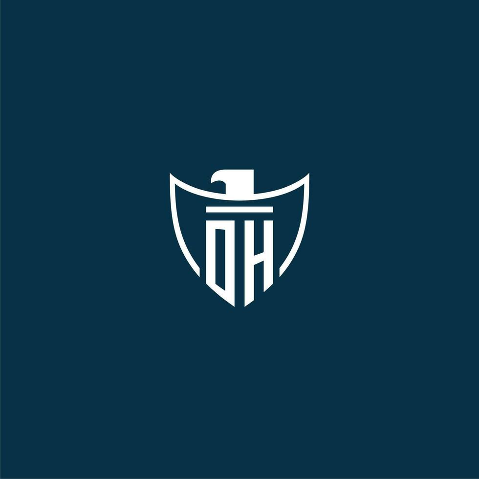 OH initial monogram logo for shield with eagle image vector design