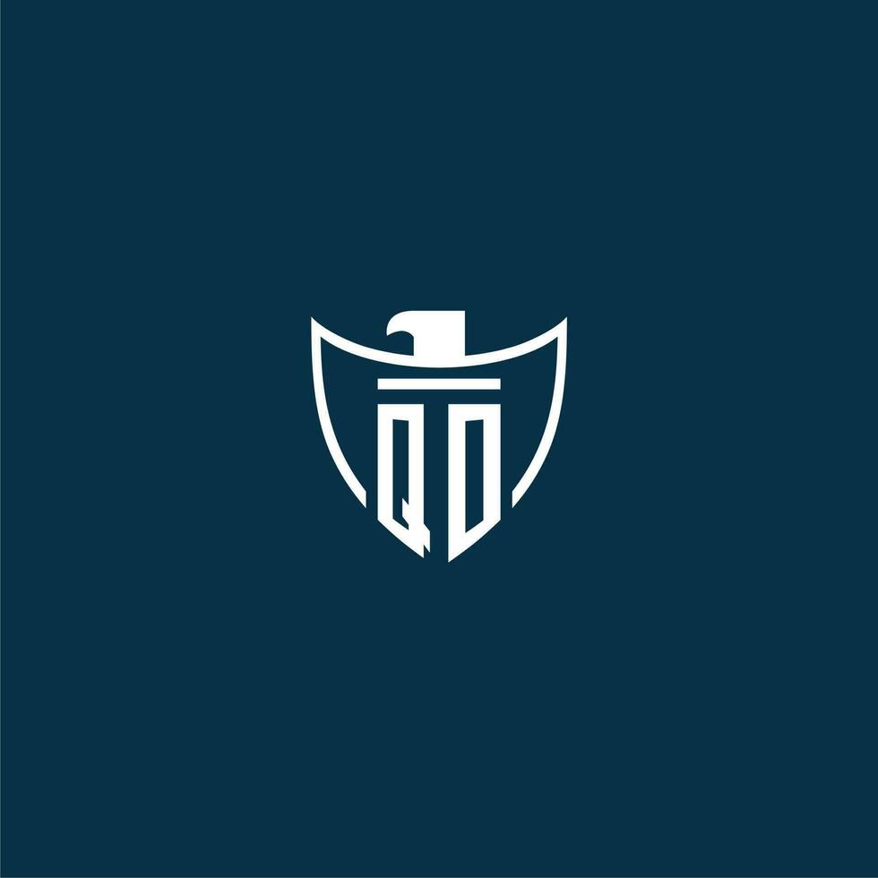 QO initial monogram logo for shield with eagle image vector design