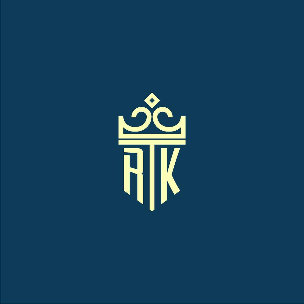 RK initial monogram shield logo design for crown vector image