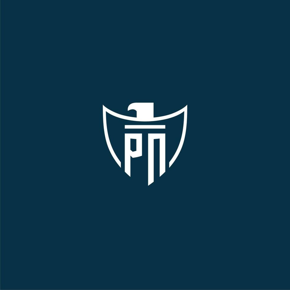 PN initial monogram logo for shield with eagle image vector design