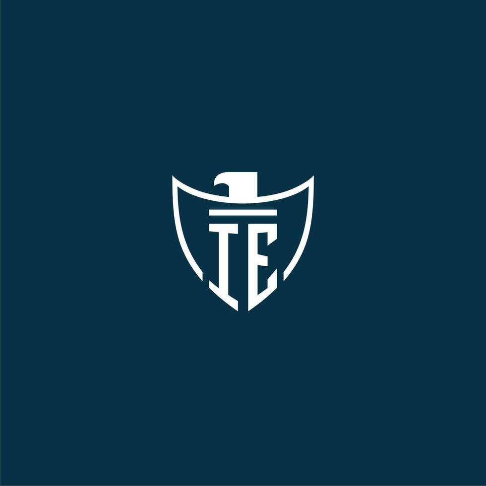 IE initial monogram logo for shield with eagle image vector design