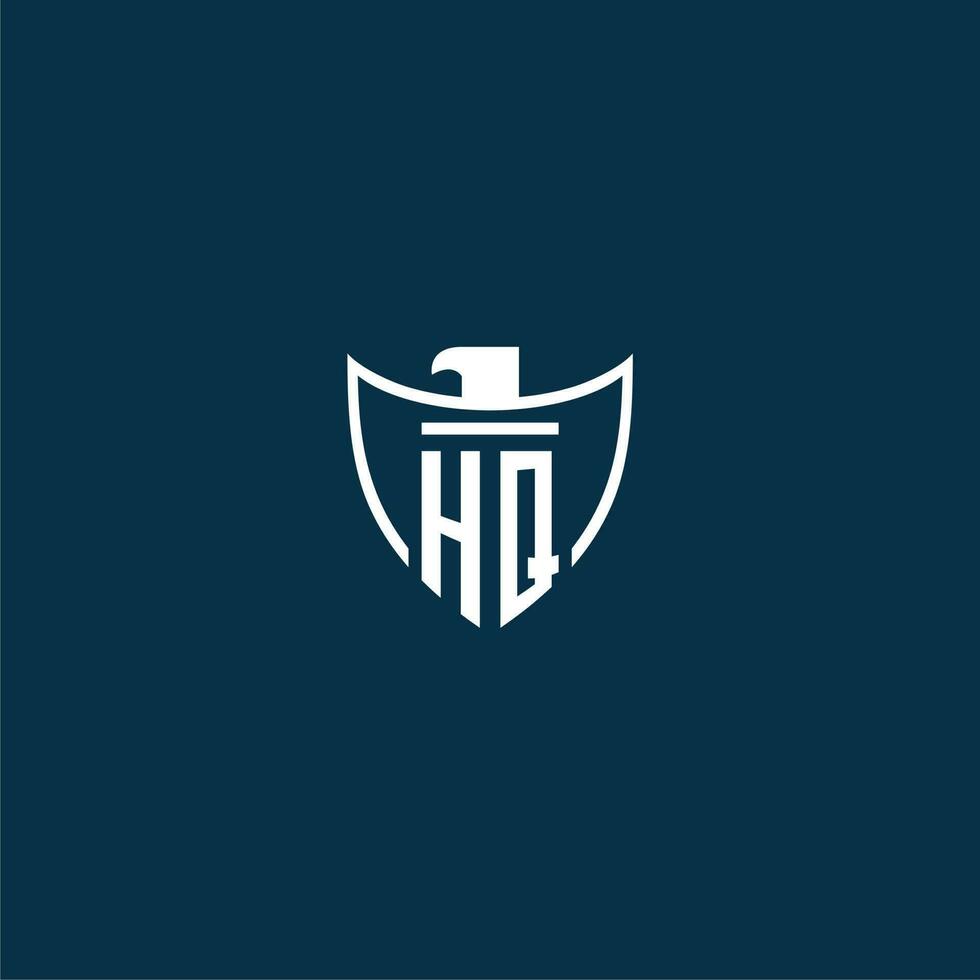 HQ initial monogram logo for shield with eagle image vector design