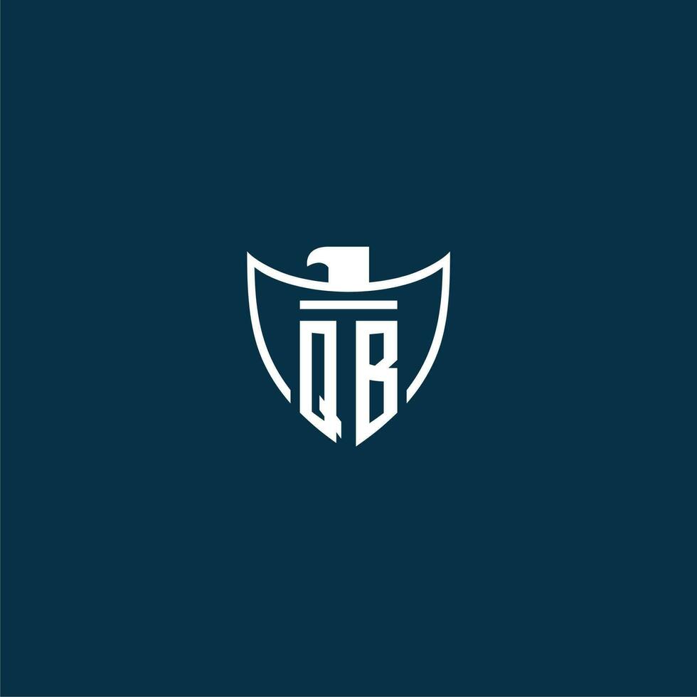 QB initial monogram logo for shield with eagle image vector design