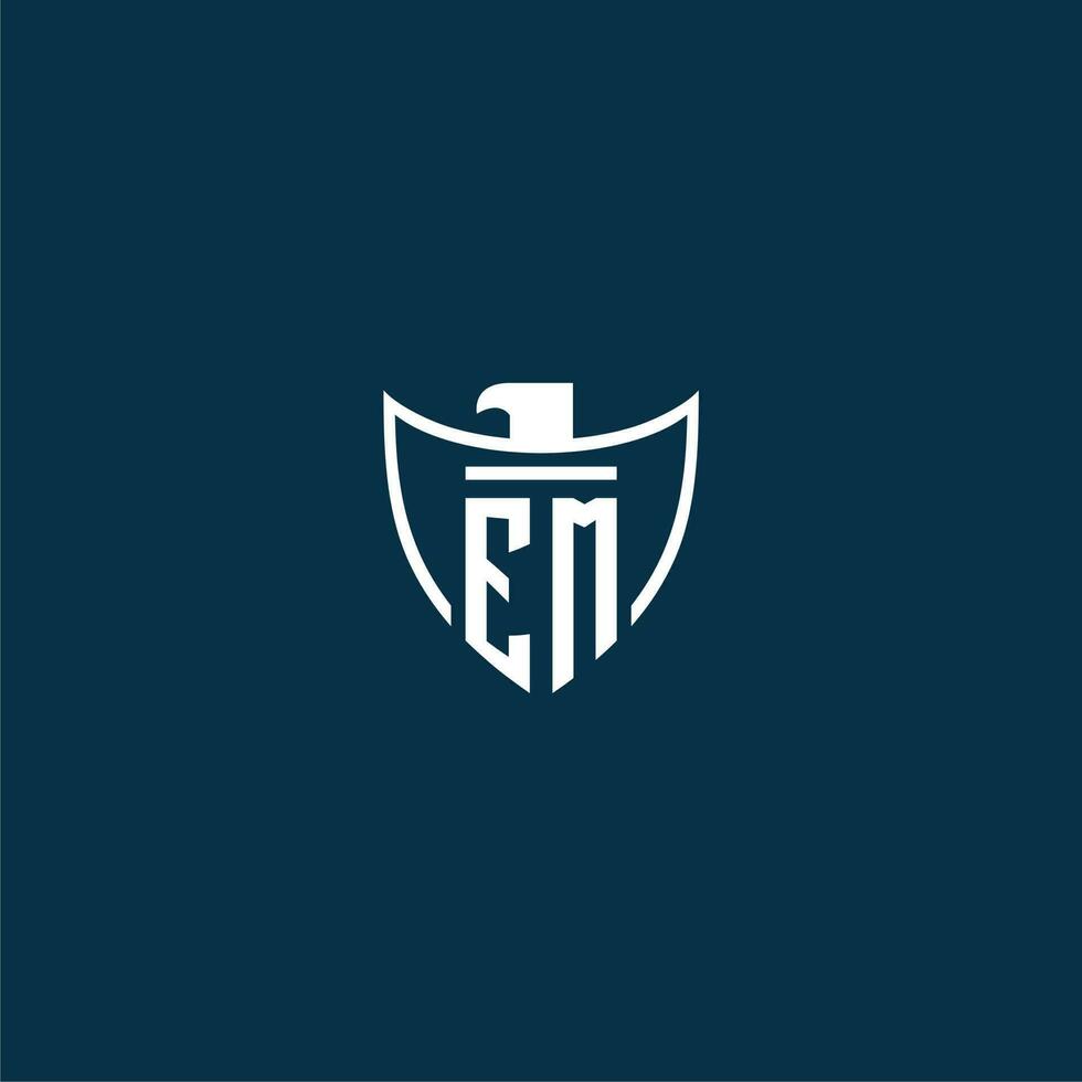 EM initial monogram logo for shield with eagle image vector design