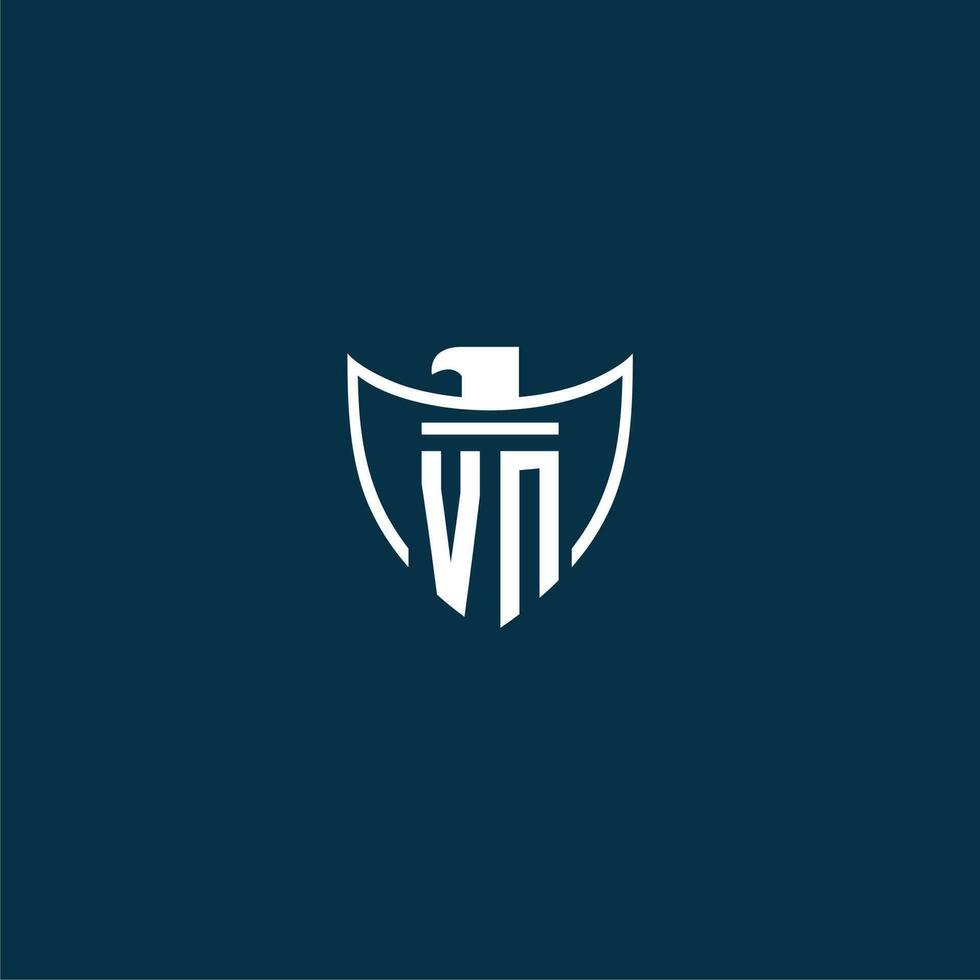 VN initial monogram logo for shield with eagle image vector design