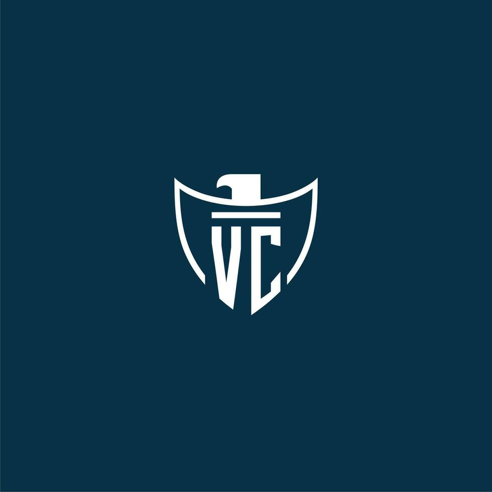VC initial monogram logo for shield with eagle image vector design