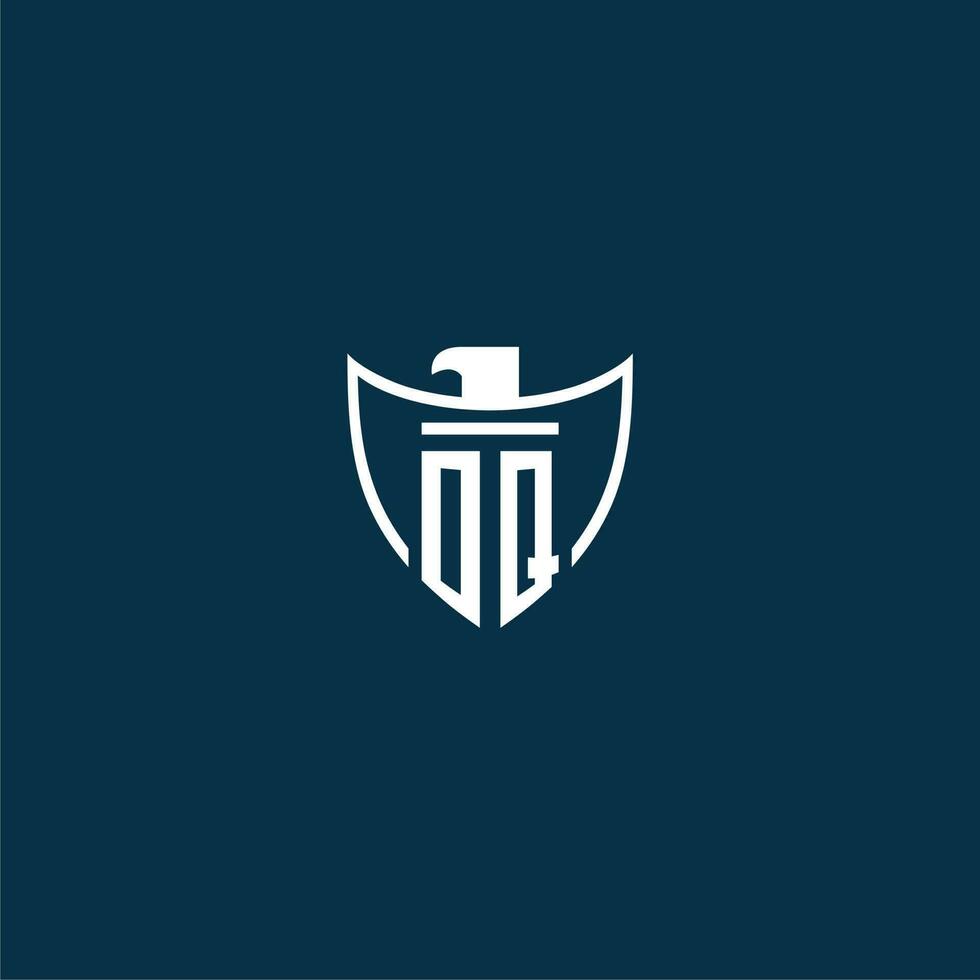 OQ initial monogram logo for shield with eagle image vector design