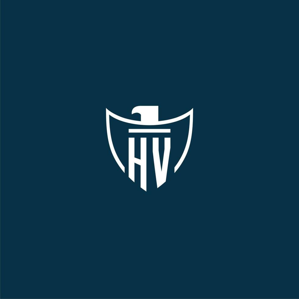 HV initial monogram logo for shield with eagle image vector design