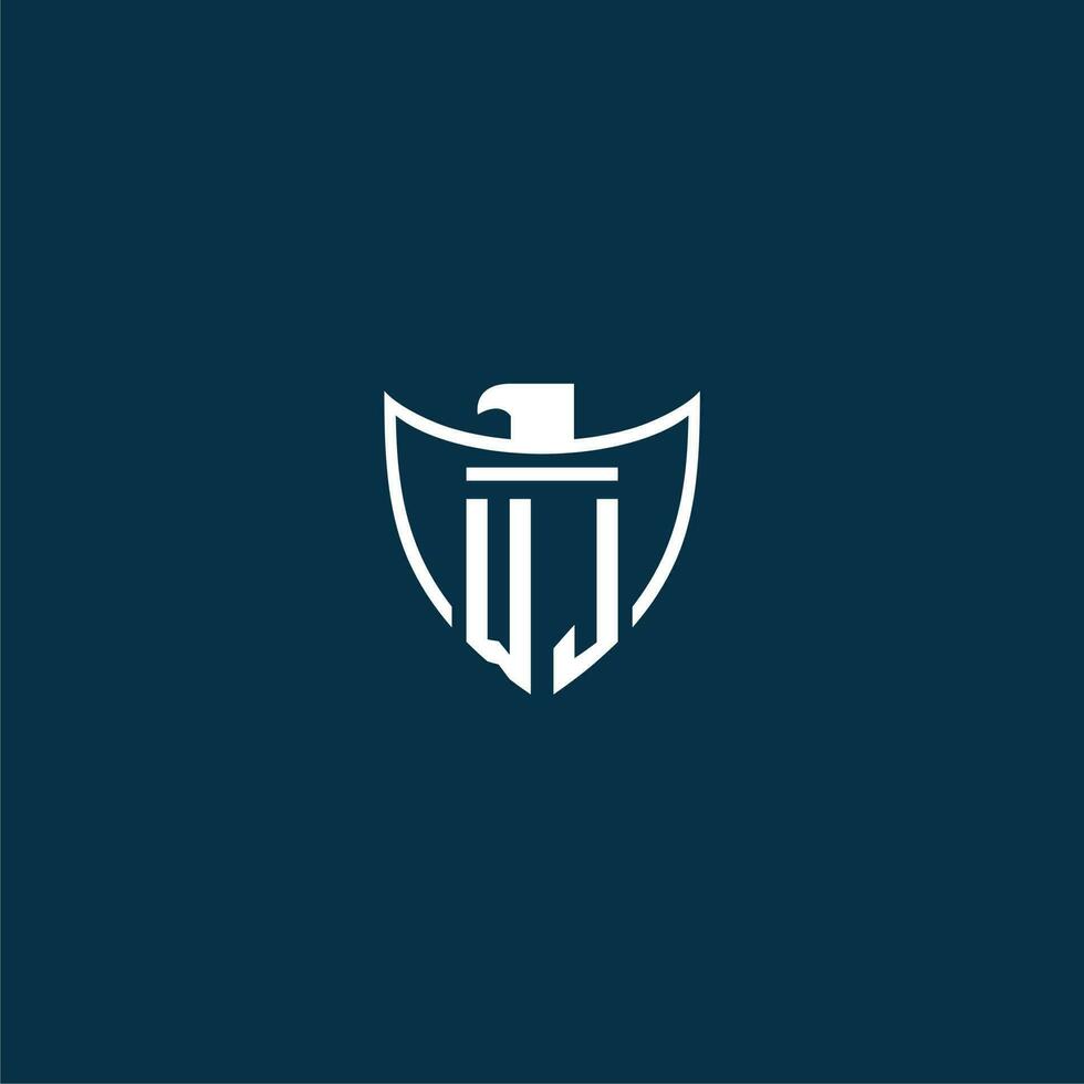 WJ initial monogram logo for shield with eagle image vector design