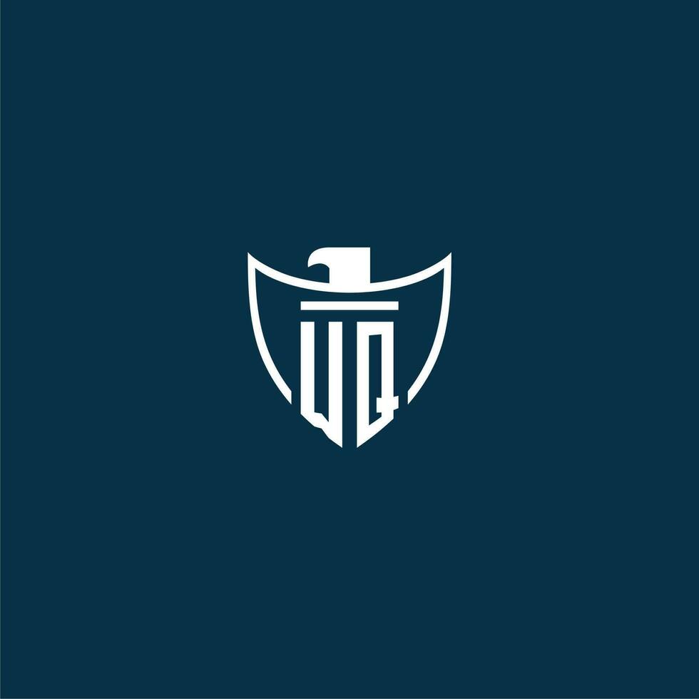 WQ initial monogram logo for shield with eagle image vector design