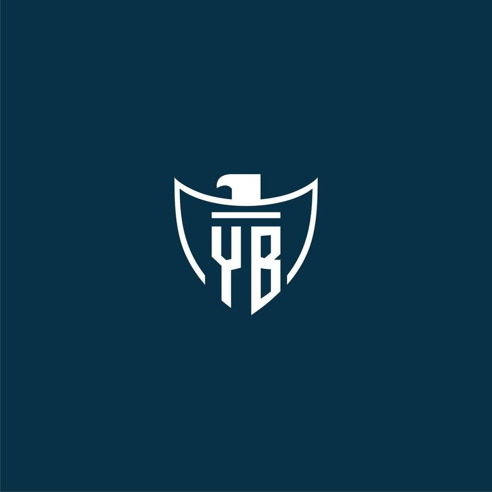 YB initial monogram logo for shield with eagle image vector design