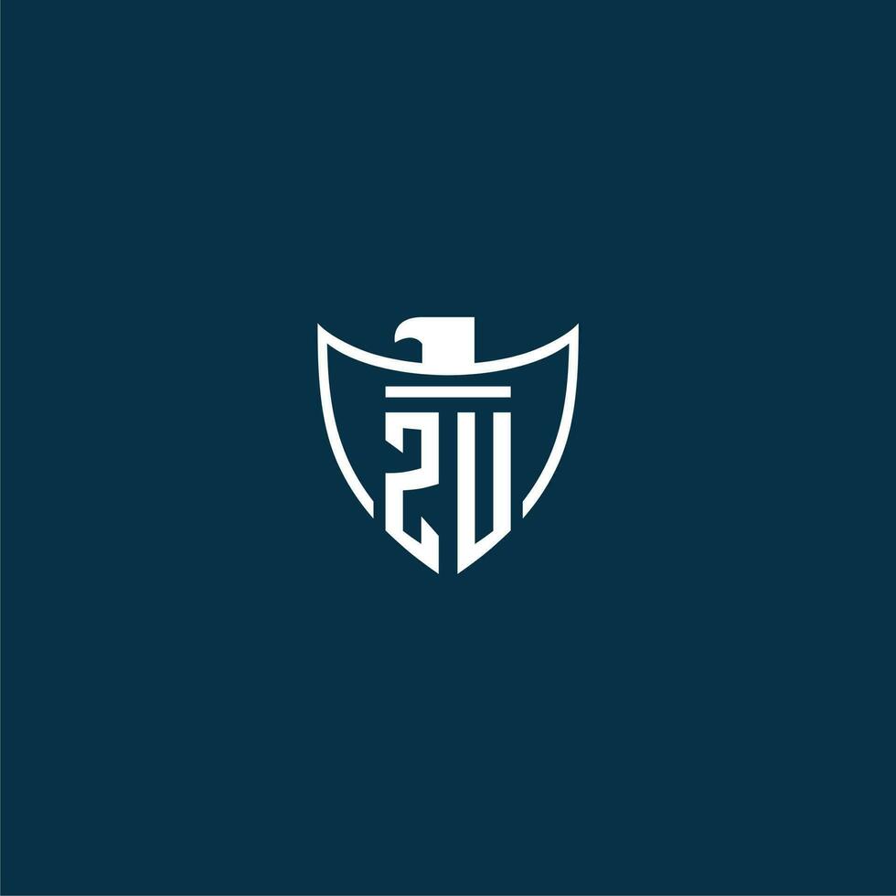 ZU initial monogram logo for shield with eagle image vector design