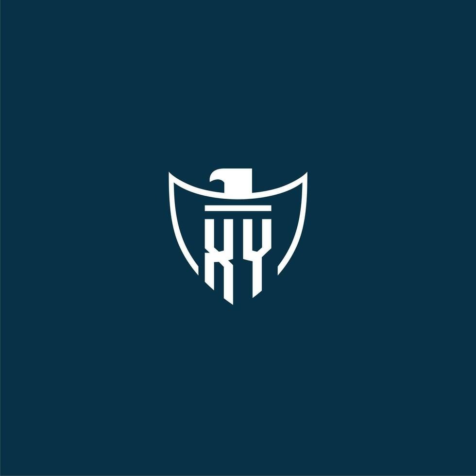 XY initial monogram logo for shield with eagle image vector design