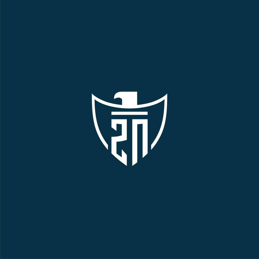 ZN initial monogram logo for shield with eagle image vector design