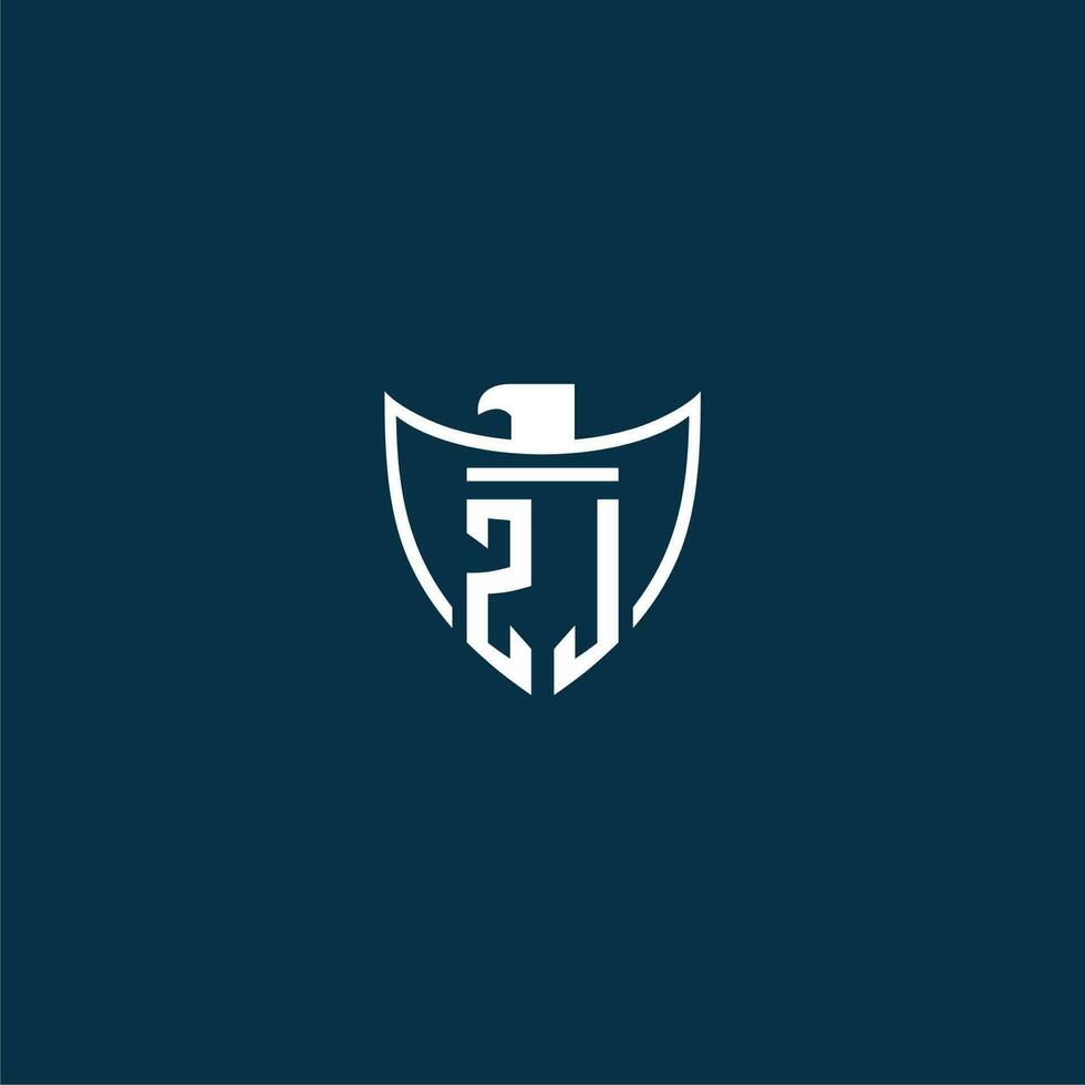 ZJ initial monogram logo for shield with eagle image vector design