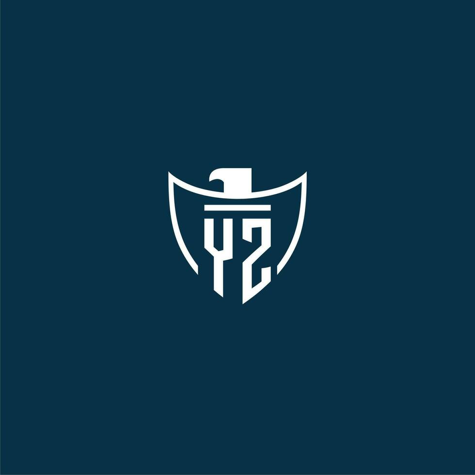 YZ initial monogram logo for shield with eagle image vector design