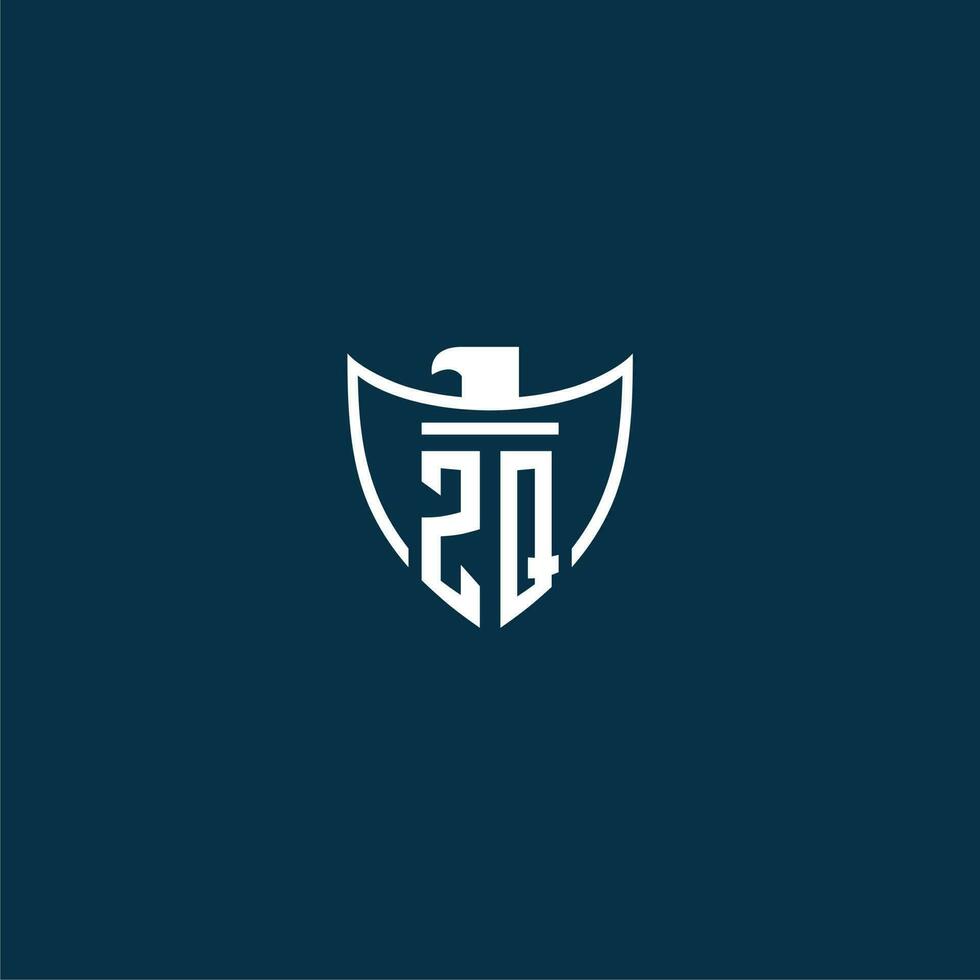 ZQ initial monogram logo for shield with eagle image vector design