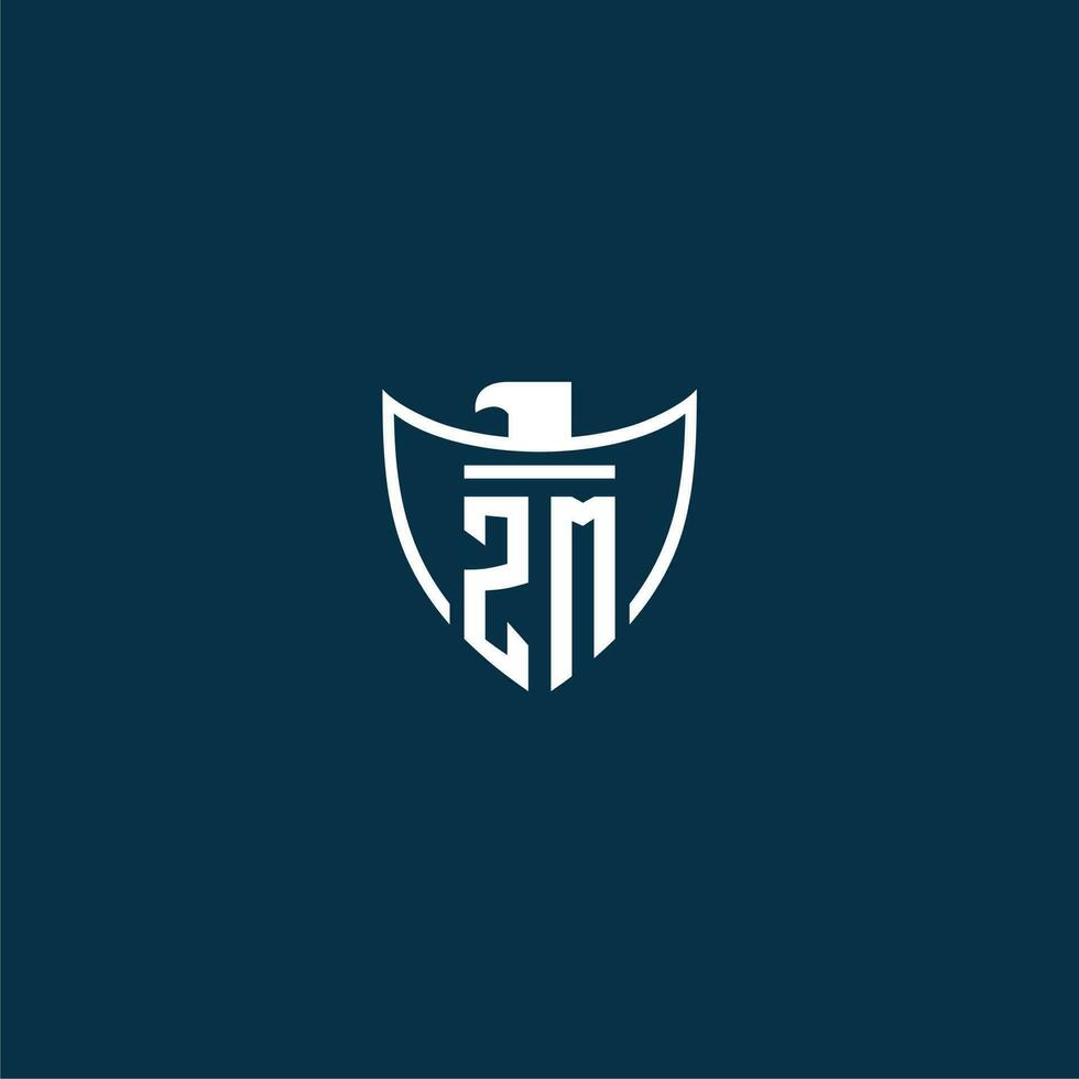 ZM initial monogram logo for shield with eagle image vector design