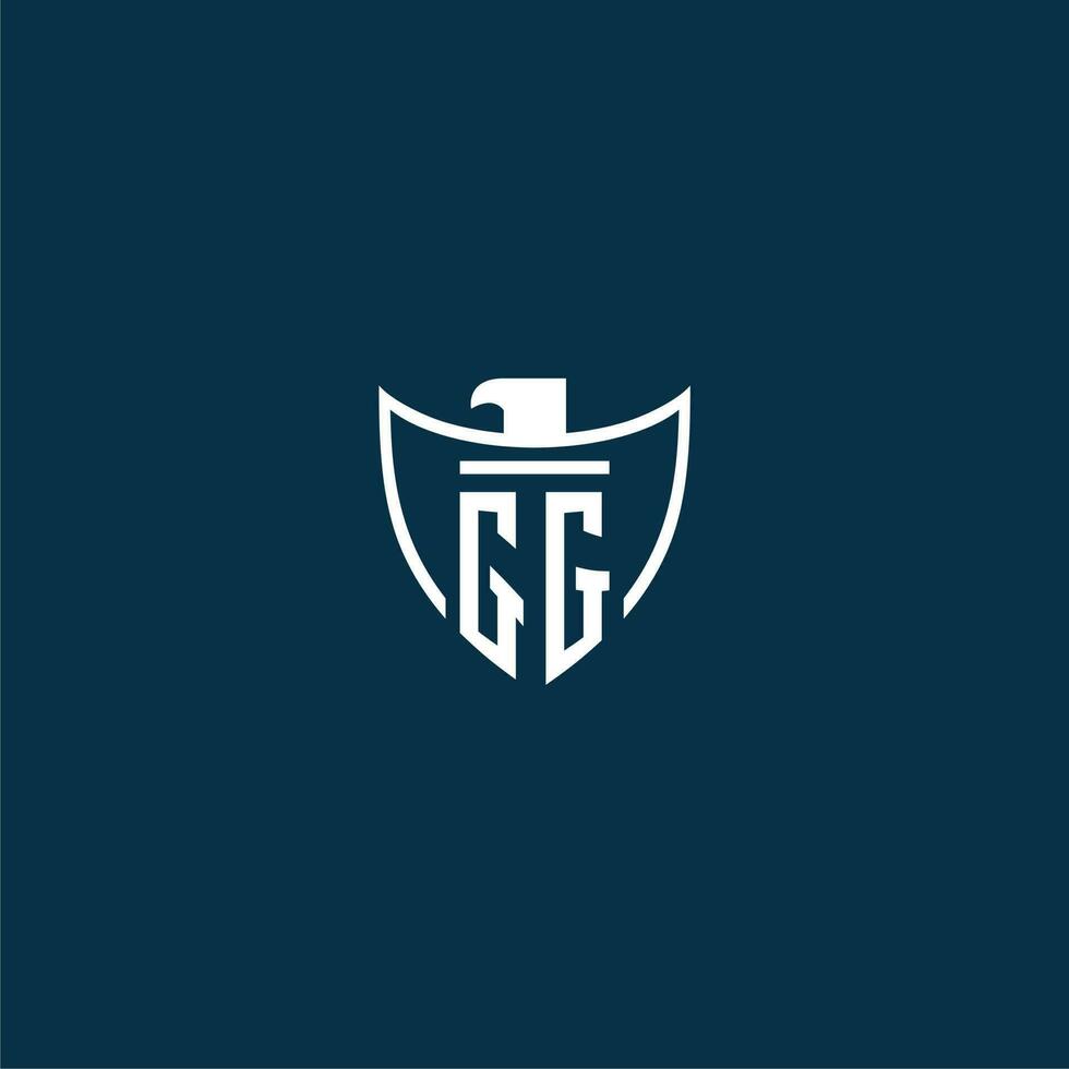 GG initial monogram logo for shield with eagle image vector design