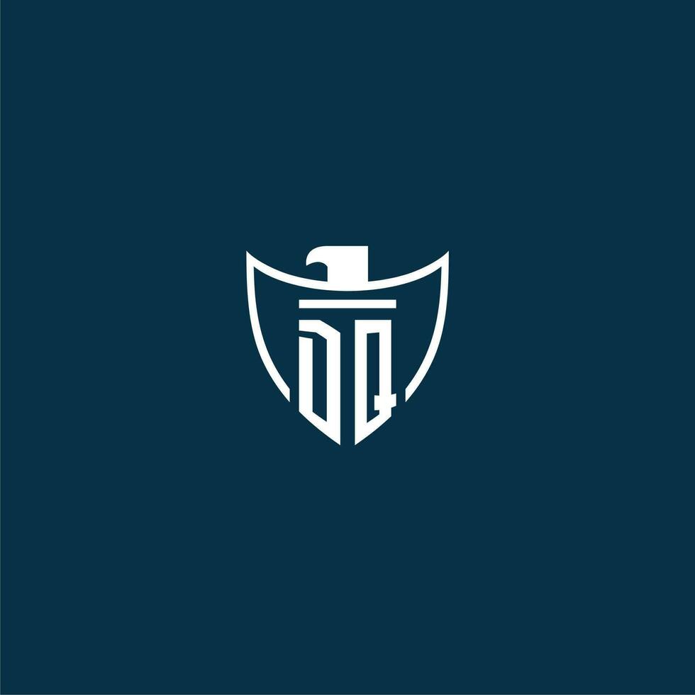 DQ initial monogram logo for shield with eagle image vector design