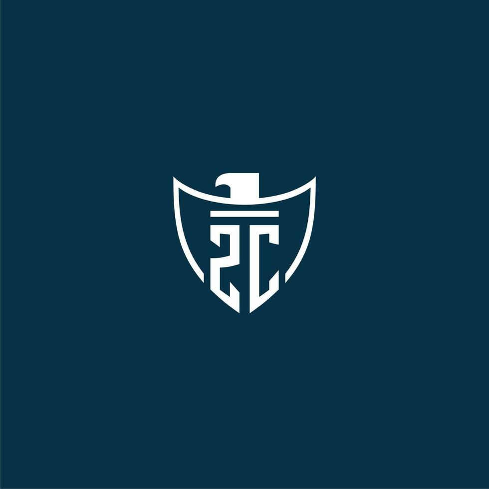 ZC initial monogram logo for shield with eagle image vector design