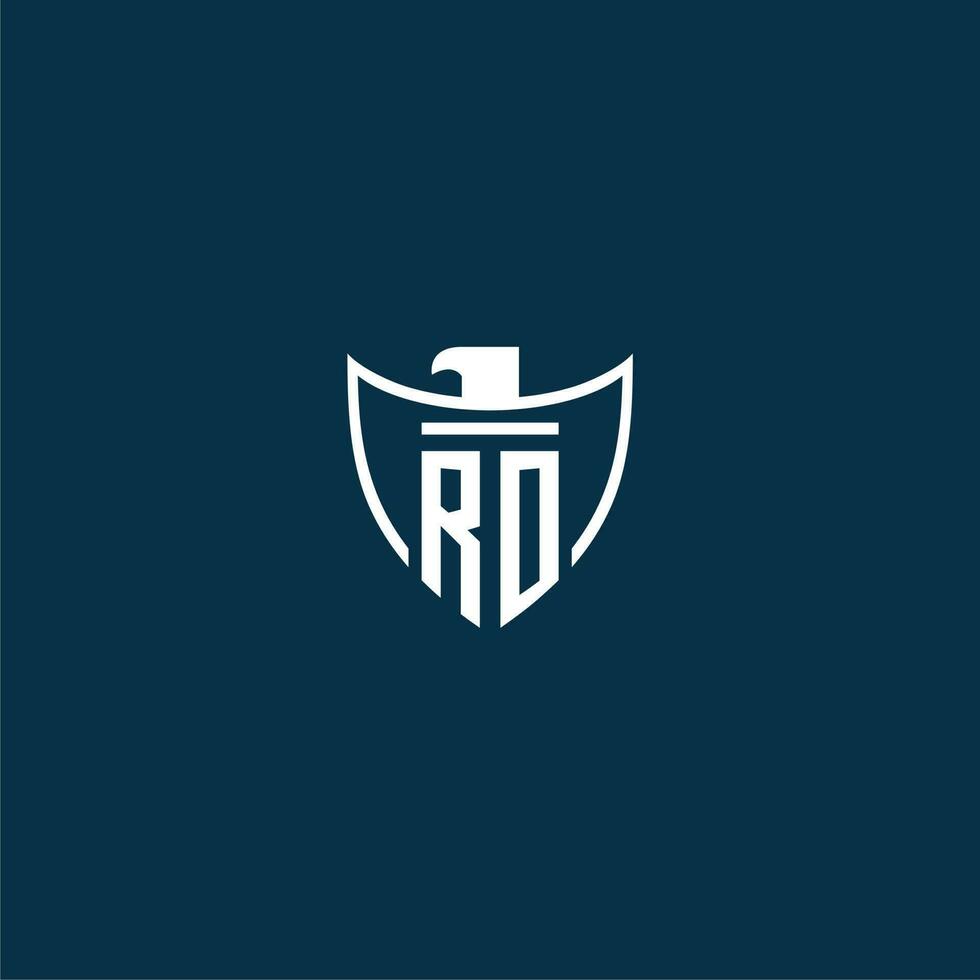 RO initial monogram logo for shield with eagle image vector design