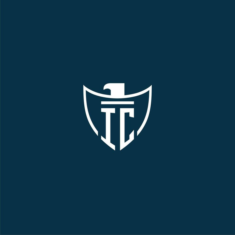 IC initial monogram logo for shield with eagle image vector design